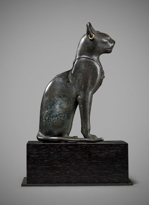 •Rupert Wace Ancient Art Limited. Egyptian Bronze Cat. Late Dynastic Period, 25th-31st Dynasty 715-332 BC.